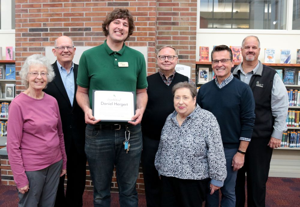 Pictured from left: Trustees Ellen Dalton, Ken Frisch (President); 2023 Gibson recipient Daniel Hergert; Trustees Mike Sibbersen, Becky Bhaer, Brian Paskvan, and Greg Esposito.